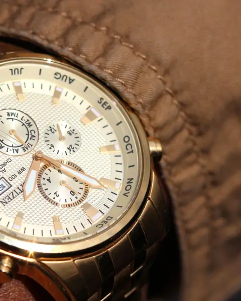 A gold chronograph wristwatch